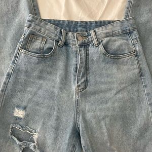 blue ripped jeans